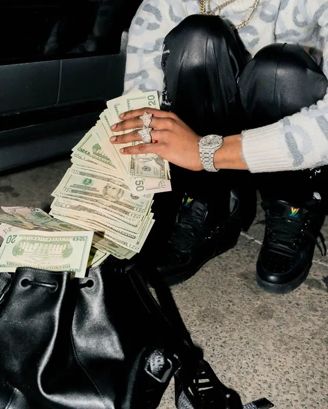 Smooky MarGielaa outfit in Casablanca, Cartier, and New Era, 2021