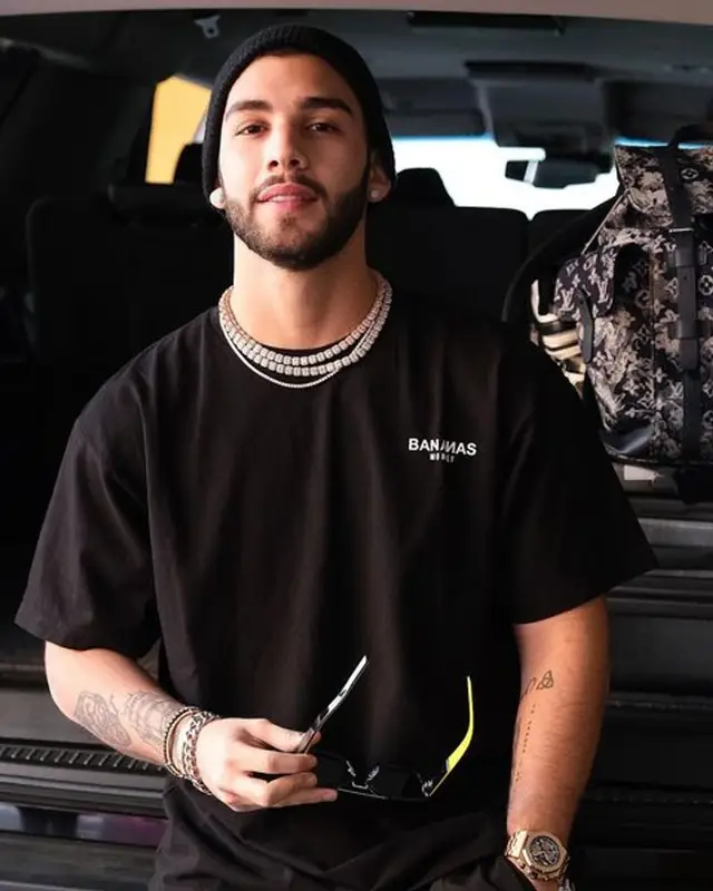 Manuel Turizo outfit in Puma, Louis Vuitton, and Prada, 2021
