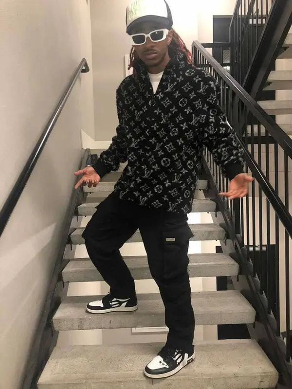 Lil HBK outfit in Louis Vuitton, Dior, and Versace, 2021
