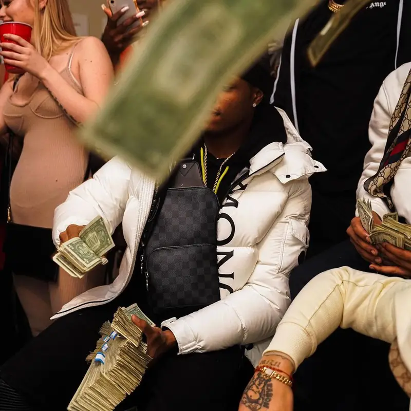 TJ Porter outfit in Moncler, Amiri, and Louis Vuitton, 2021