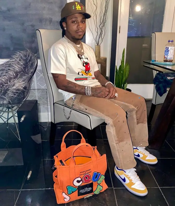 Jacquees outfit in Gucci, Gallery Dept., and Disney, 2021