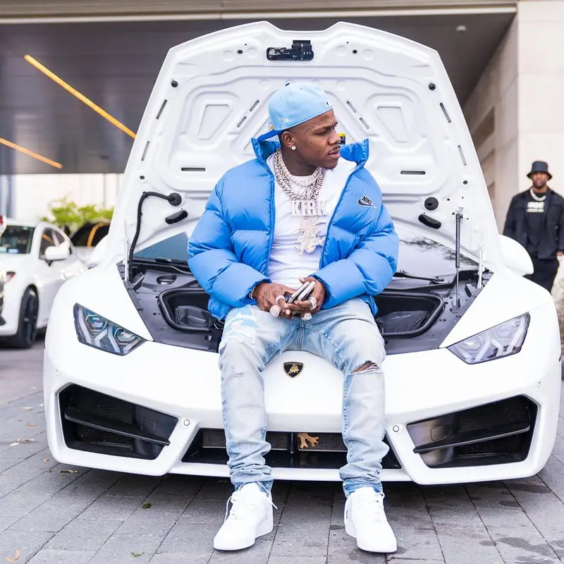 DaBaby outfit in Supreme, New Era, and Nike, 2021