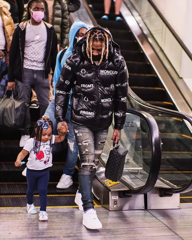 Lil Durk outfit in Moncler, Louis Vuitton, and Fragment, 2021