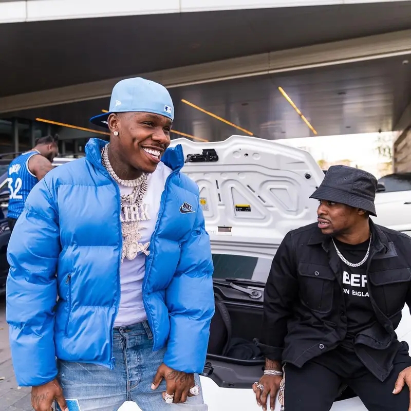 DaBaby outfit in Supreme, New Era, and Nike, 2021
