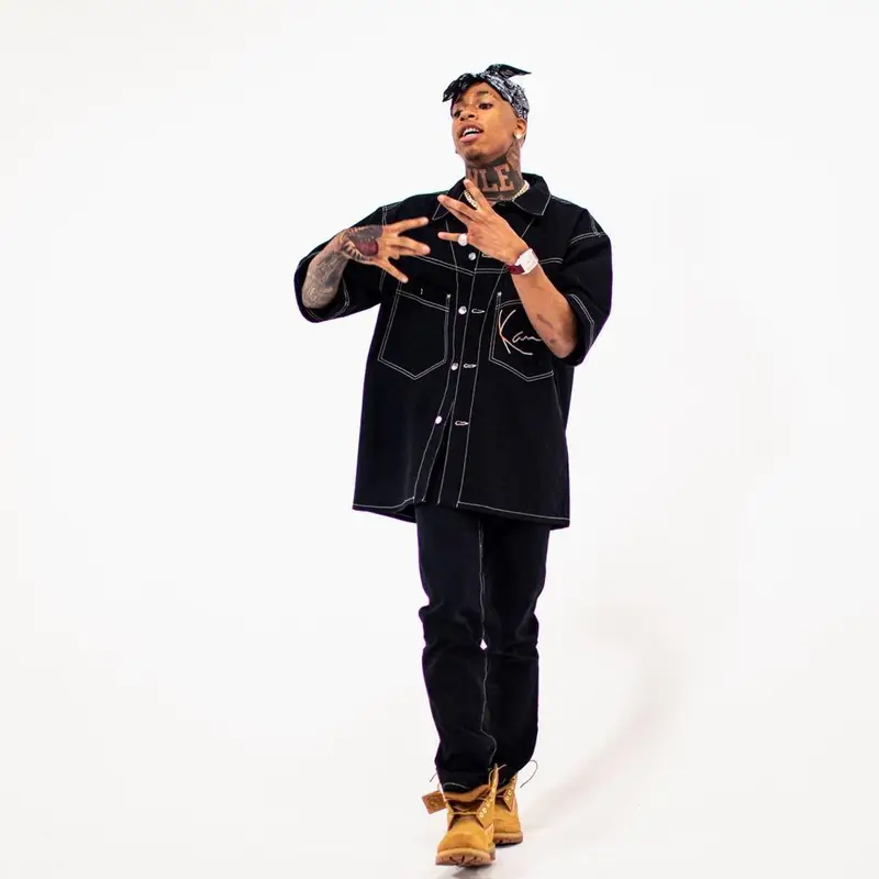 NLE Choppa outfit in Karl Kani, Timberland, and NLE Choppa Merch , 2021