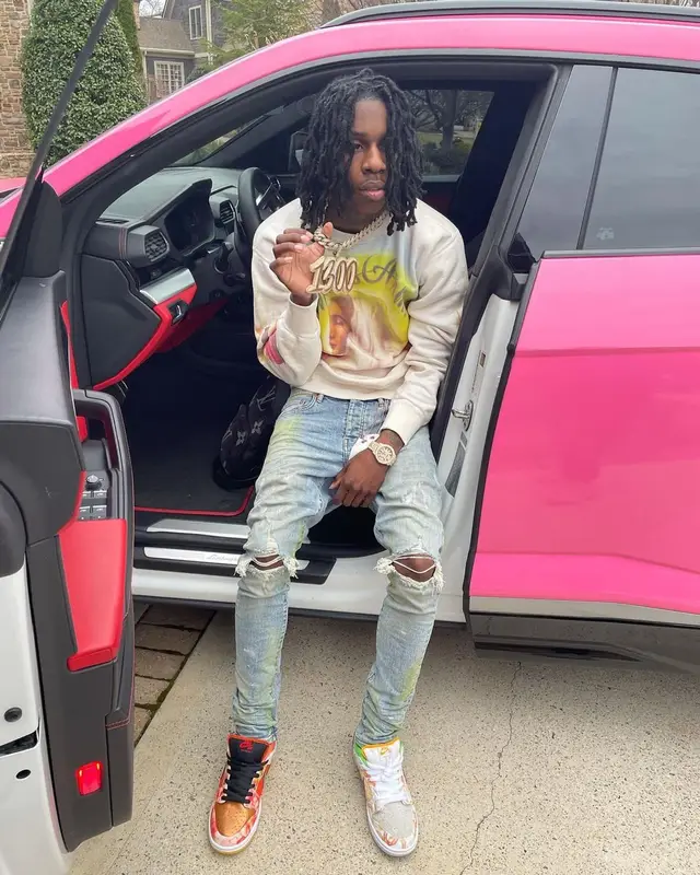 Polo G outfit in Saint Michael, Purple Brand, and Nike, 2021