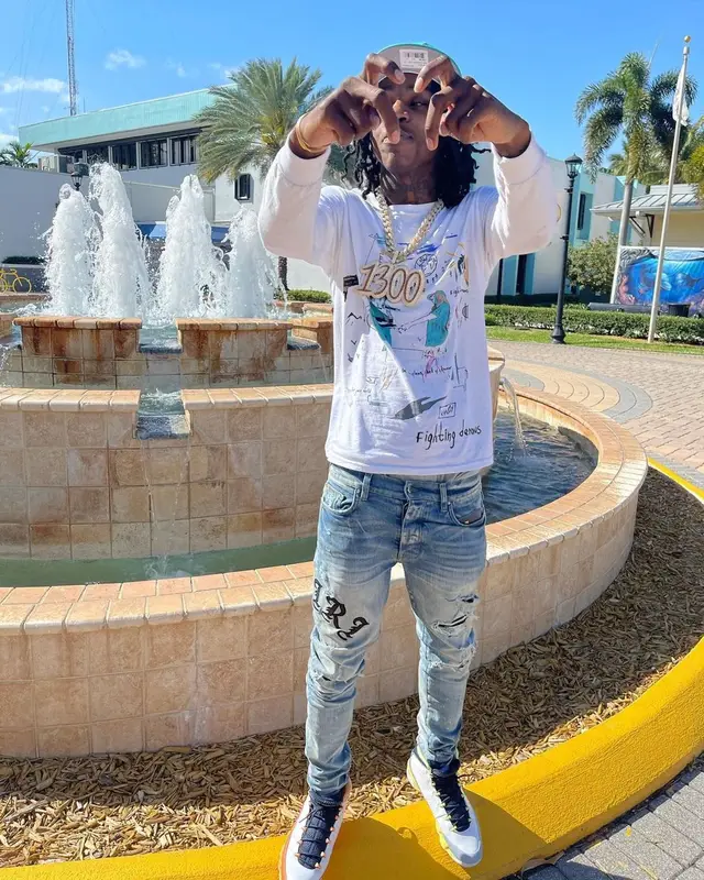 Polo G outfit in Juice Wrld Merch, Amiri, and REVENGE, 2021