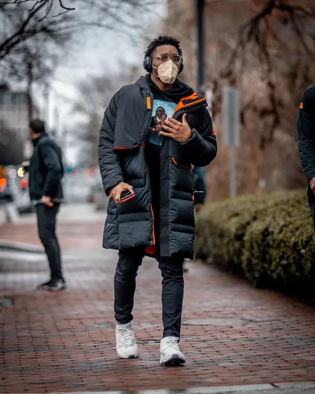 Donovan Mitchell outfit in Adidas, Louis Vuitton, and Retrosuperfuture, 2021