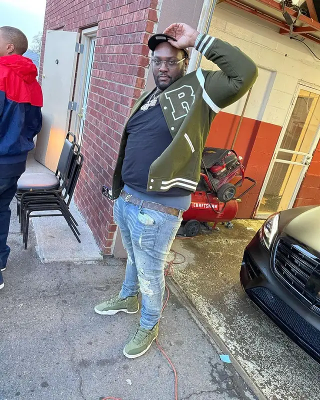 Peezy outfit in Louis Vuitton, Cartier, and New Era, 2021