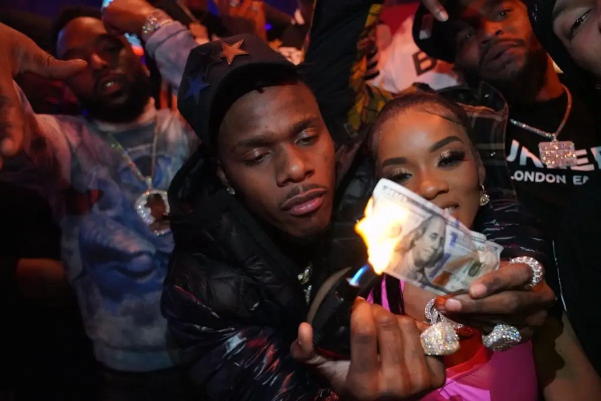 DaBaby outfit in Burberry, Louis Vuitton, and Amiri, 2021