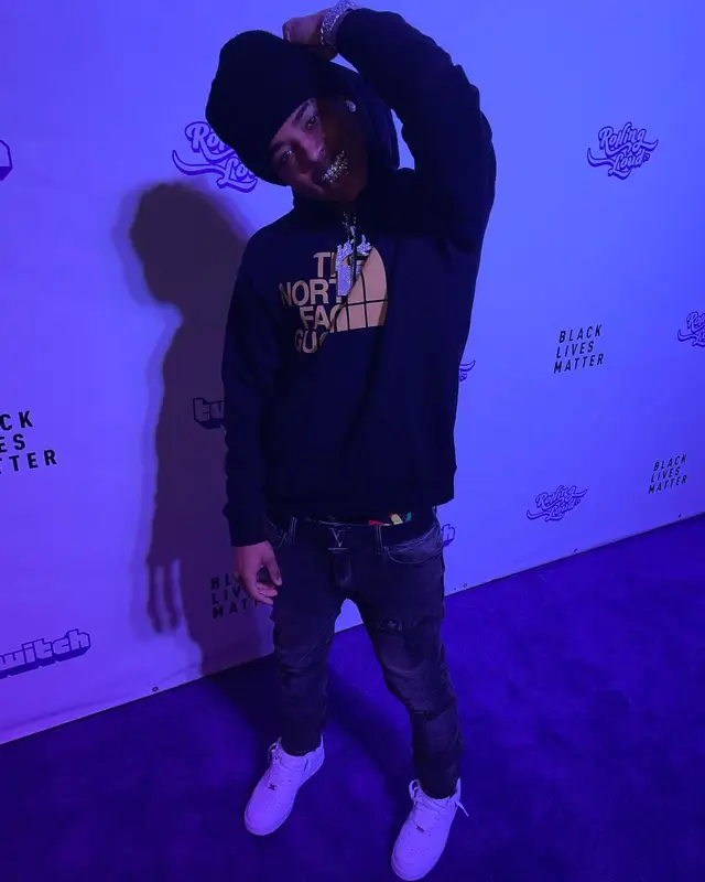 Luh Kel outfit in Gucci, Louis Vuitton, and The North Face, 2021