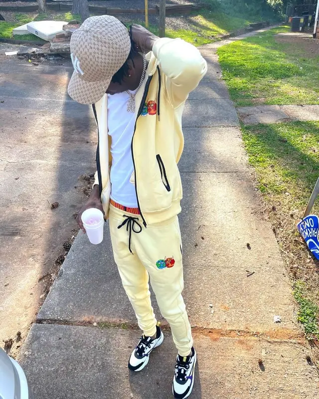 Yung Mal outfit in Dxdon, Dior, and MLB, 2021