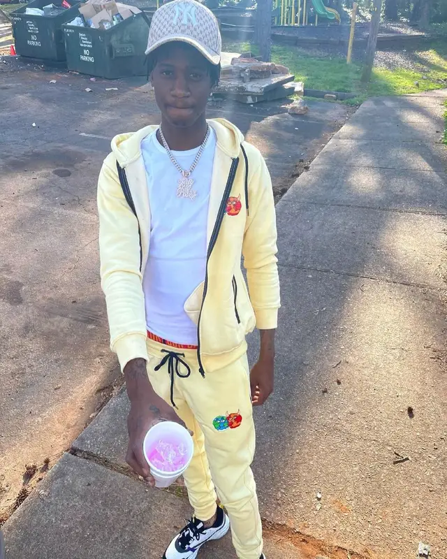 Yung Mal outfit in Dxdon, Dior, and MLB, 2021