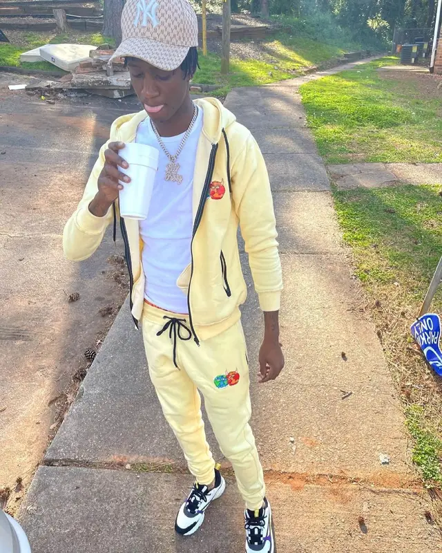 Yung Mal outfit in Dxdon, Dior, and MLB, 2021