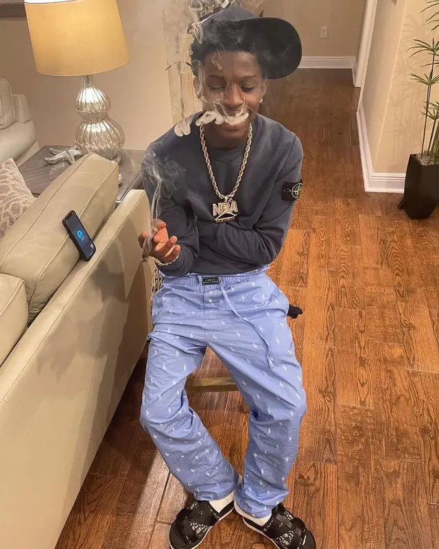 Quando Rondo outfit in Polo Ralph Lauren, Stone Island, and Dior, 2021