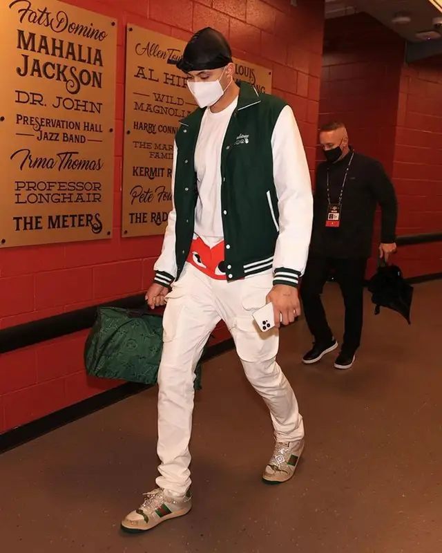Kyle Kuzma outfit in Comme Des Garcons, Louis Vuitton, and Henry Mask, 2021