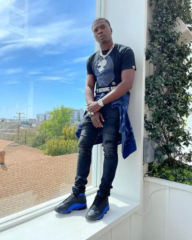 Bankroll Freddie outfit in Bape, Jordan, and Louis Vuitton, 2021