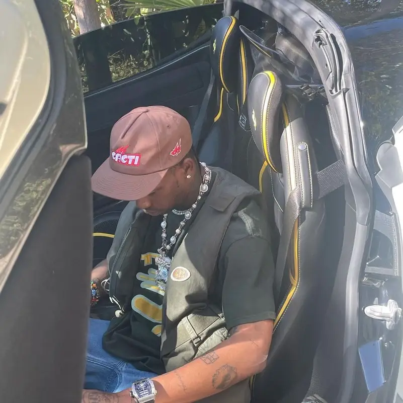 Travis Scott outfit in Visvim, Lanvin, and Cacti, 2021