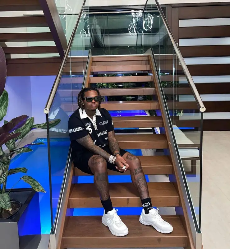 Gunna outfit in Chanel, Louis Vuitton, and Vetements, 2021