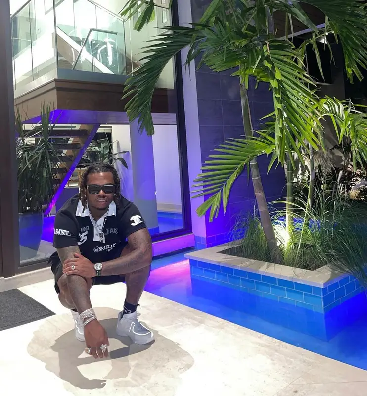 Gunna outfit in Chanel, Louis Vuitton, and Vetements, 2021