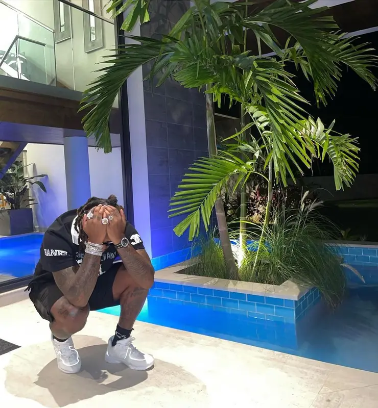 Gunna outfit in Chanel, Louis Vuitton, and Vetements, 2021