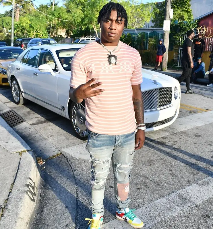 Fredo Bang outfit in Dior, Amiri, and Nike, 2021