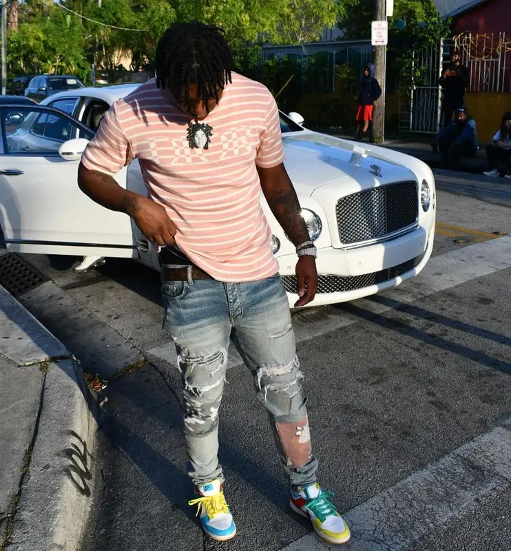 Fredo Bang outfit in Dior, Amiri, and Nike, 2021
