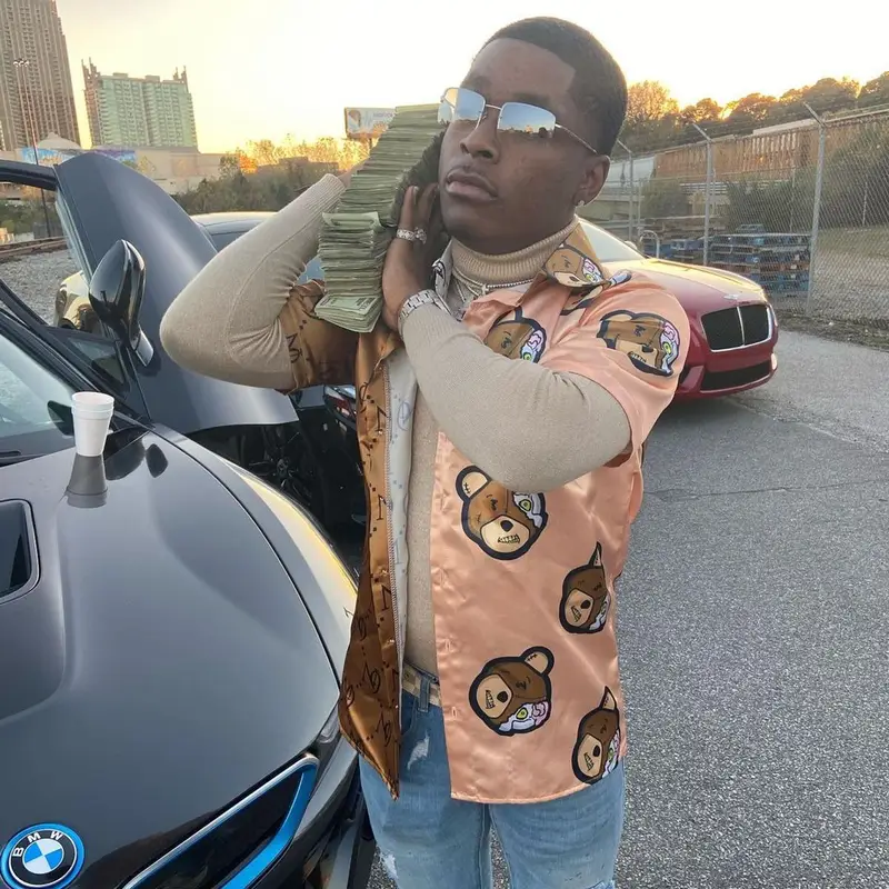 Lil Quill outfit in Amiri, Jordan, and Louis Vuitton, 2020
