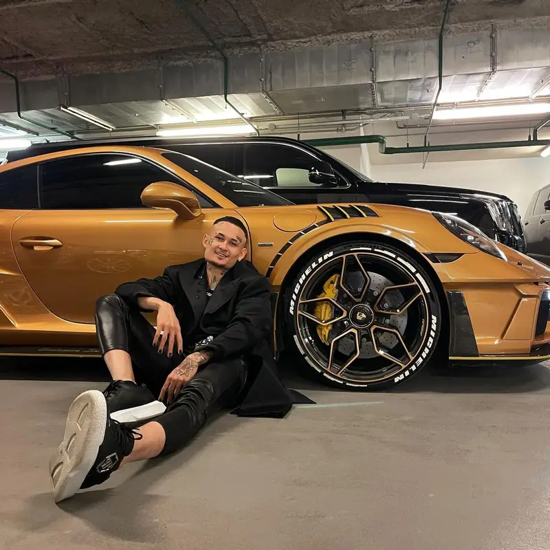 Morgenshtern outfit in Pirosmani Studio, Saint Laurent, and Philipp Plein, 2021
