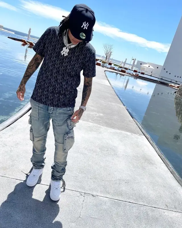 Young M.A outfit in Dior, Amiri, and New Era, 2021