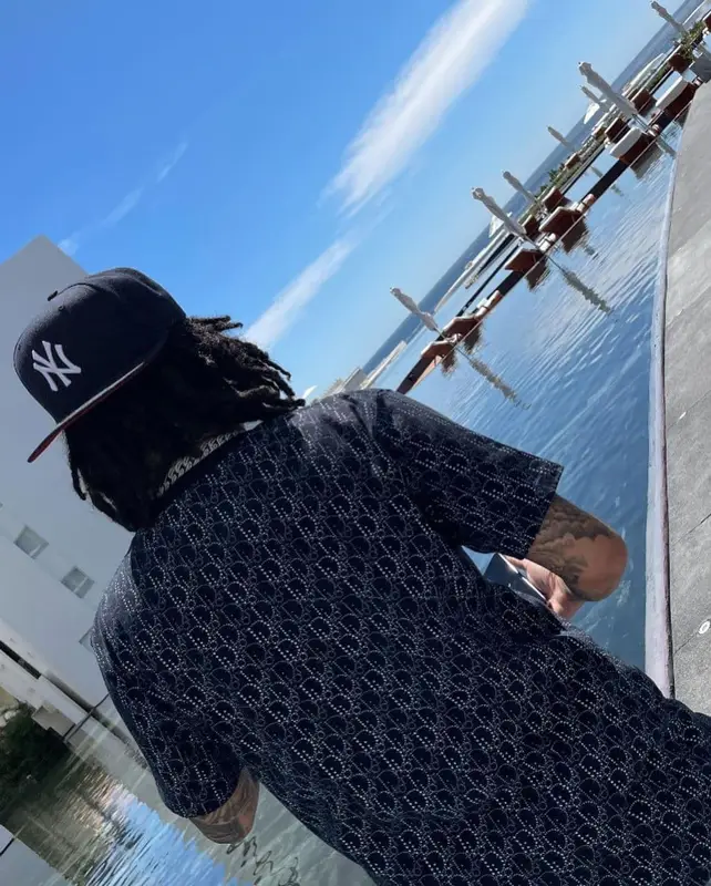 Young M.A outfit in Dior, Amiri, and New Era, 2021