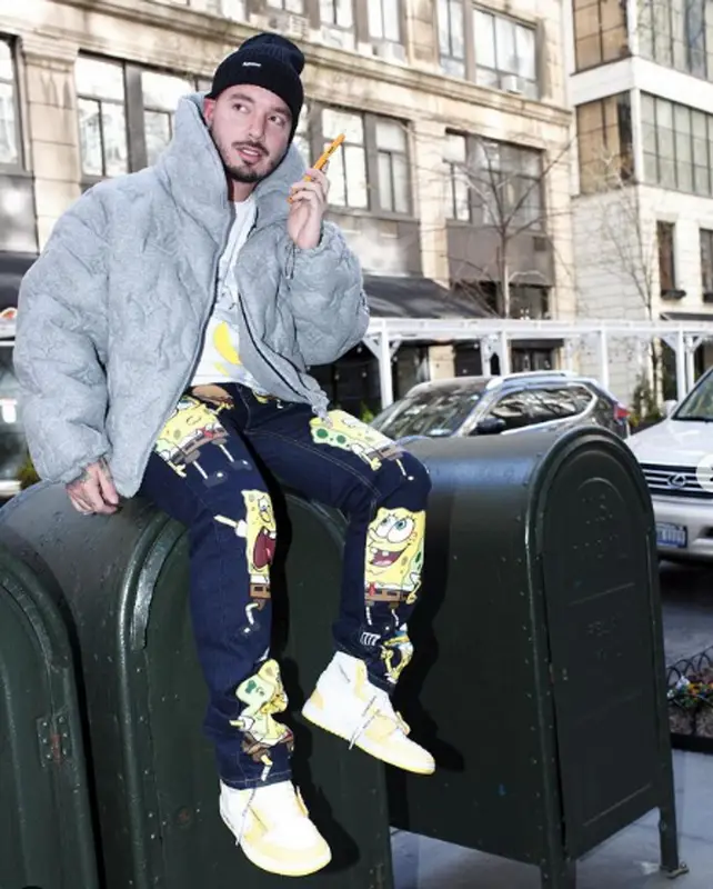 J Balvin outfit in Louis Vuitton, Kaws, and Supreme, 2021