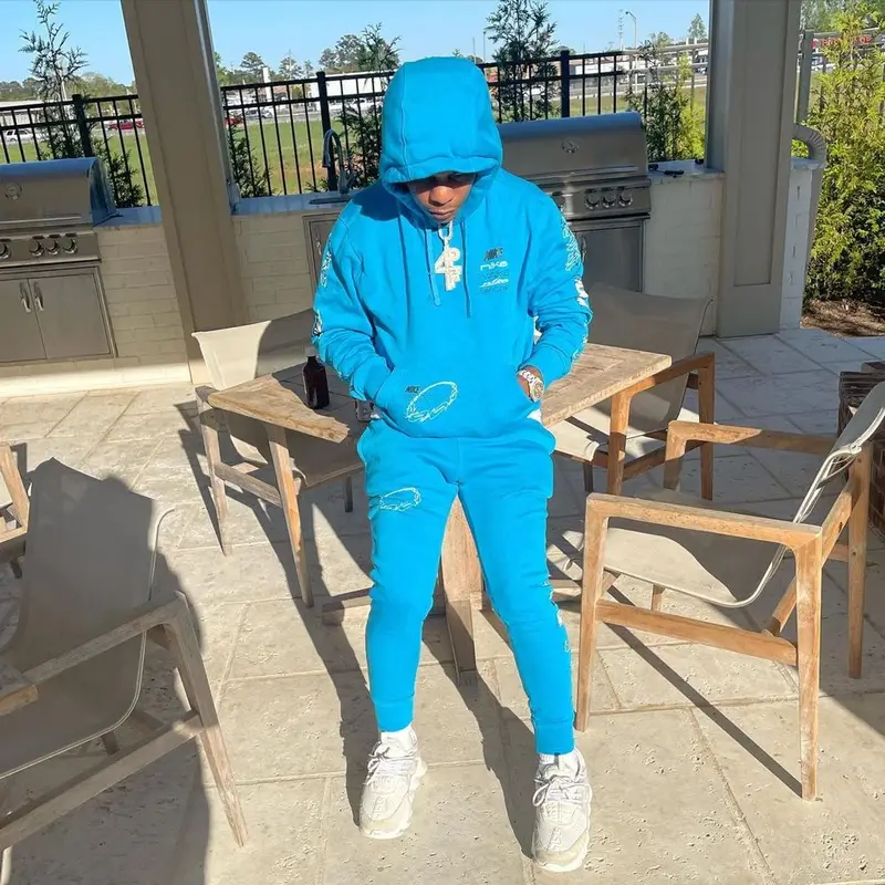 Rylo Rodriguez outfit in Nike and Versace, 2021