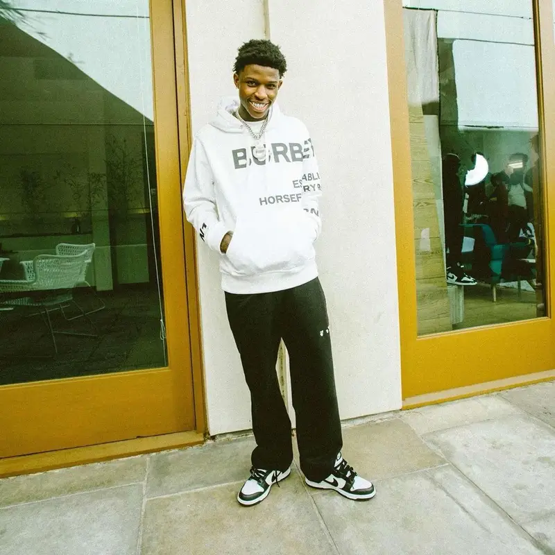 Quando Rondo outfit in Burberry, Nike, and Off-White, 2021