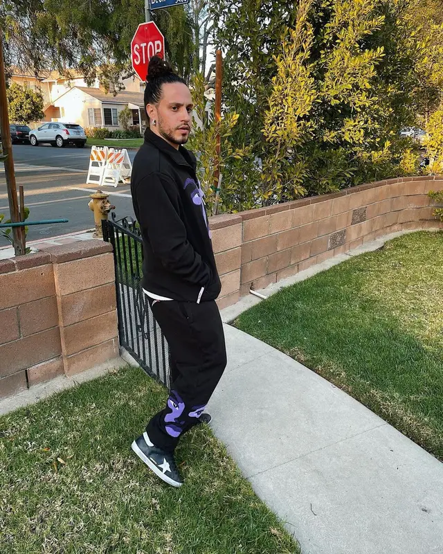 Russ outfit in Puma, Golden Goose, and KidSuper, 2021