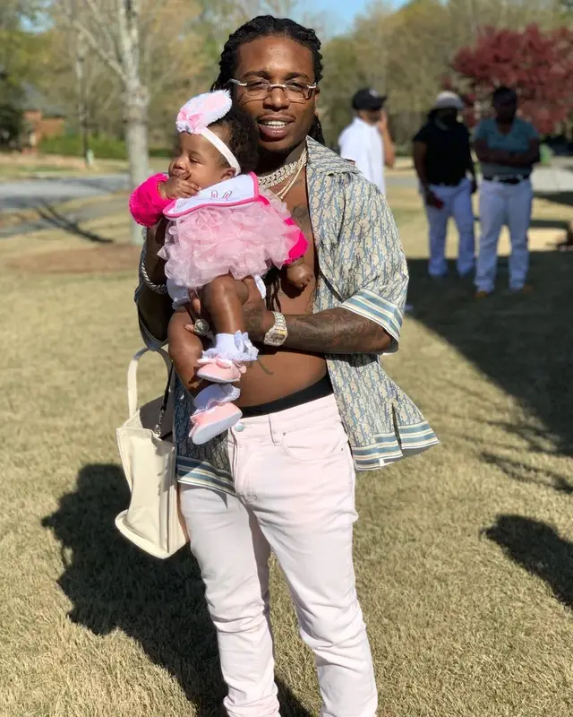 Jacquees outfit in Dior, Armani Exchange, and Cartier, 2021