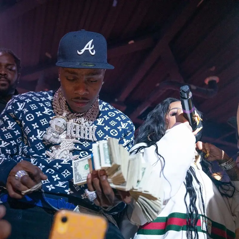 DaBaby outfit in Louis Vuitton, Amiri, and New Era, 2021