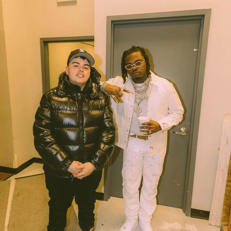 Gunna outfit in Dior, Nike, and Cartier, 2021