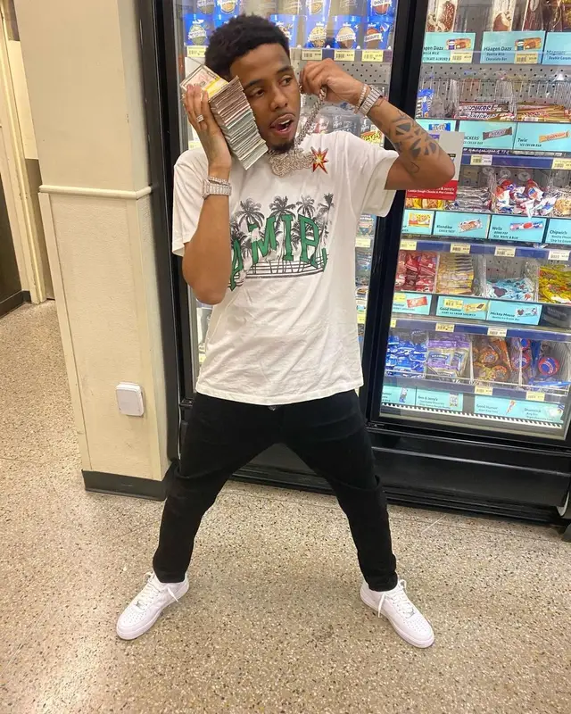 Pooh Shiesty outfit in Amiri and Nike, 2021