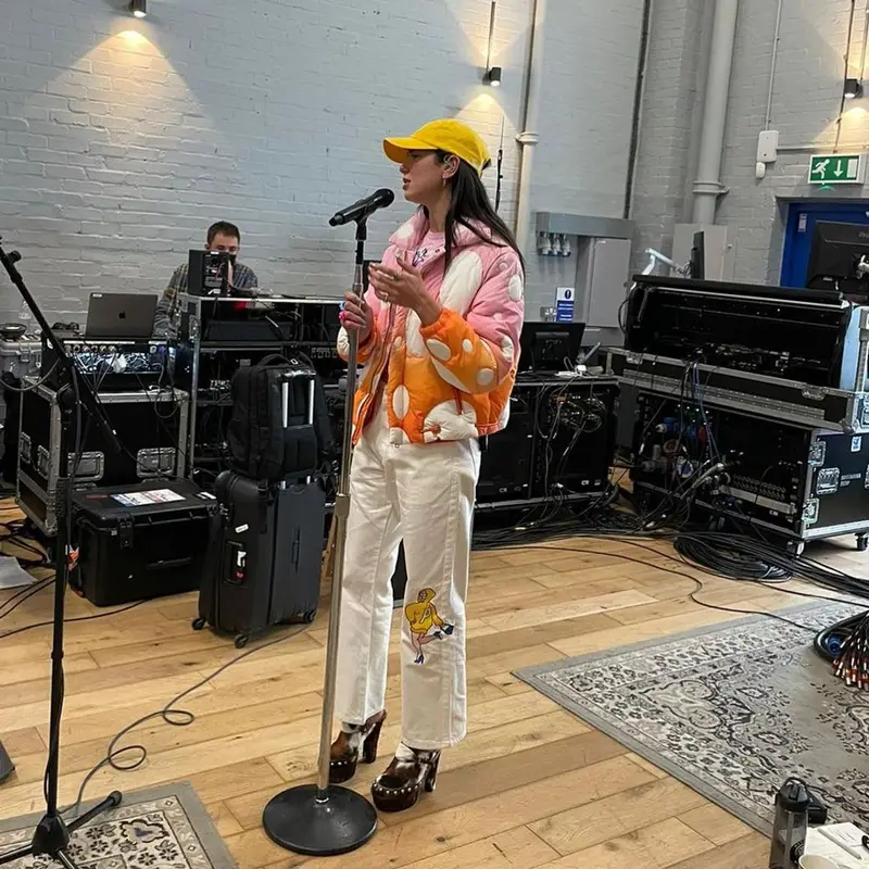 Dua Lipa outfit in ERL, Marc Jacobs, and Palace, 2021