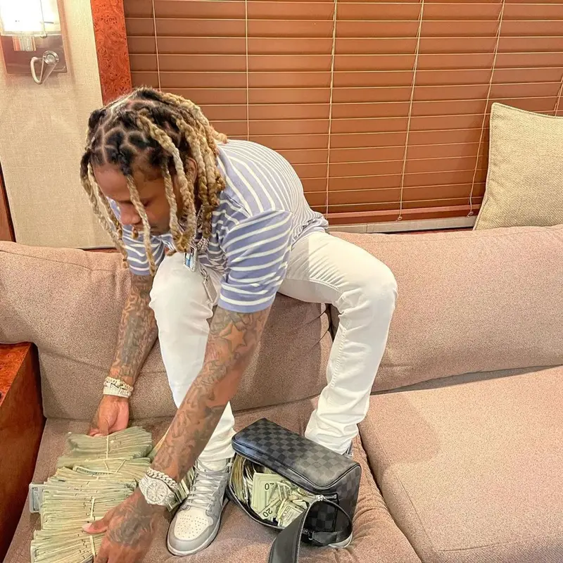 Lil Durk outfit in Dior, Nike, and Louis Vuitton, 2021