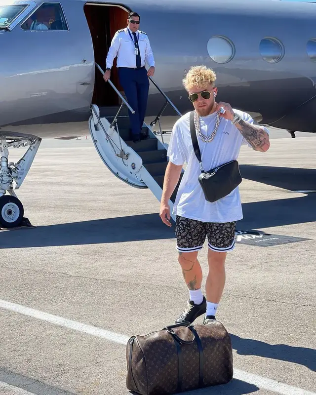 Jake Paul outfit in Louis Vuitton and Saint Laurent, 2021