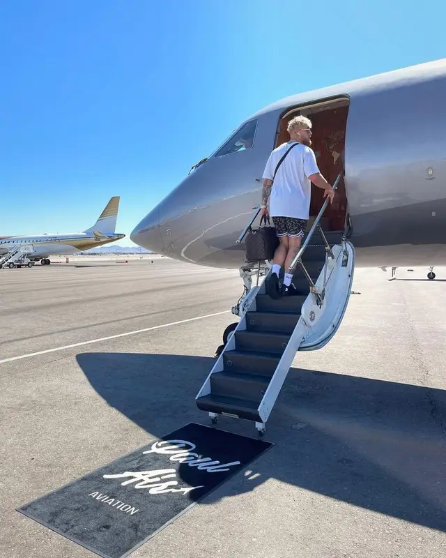 Jake Paul outfit in Louis Vuitton and Saint Laurent, 2021
