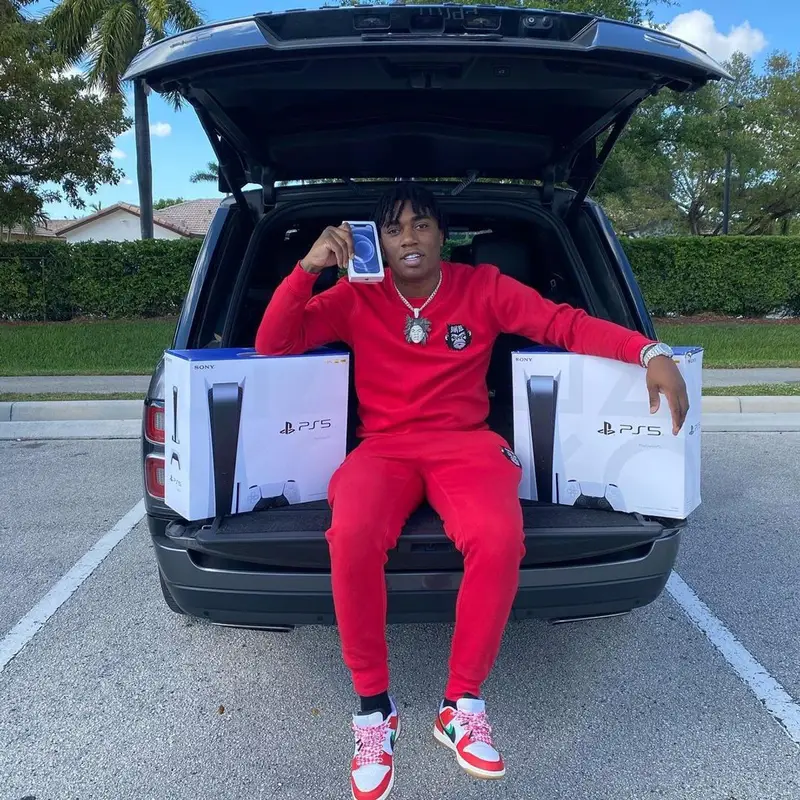 Fredo Bang outfit in Bang Biz Clothing, Nike, and PlayStation, 2021
