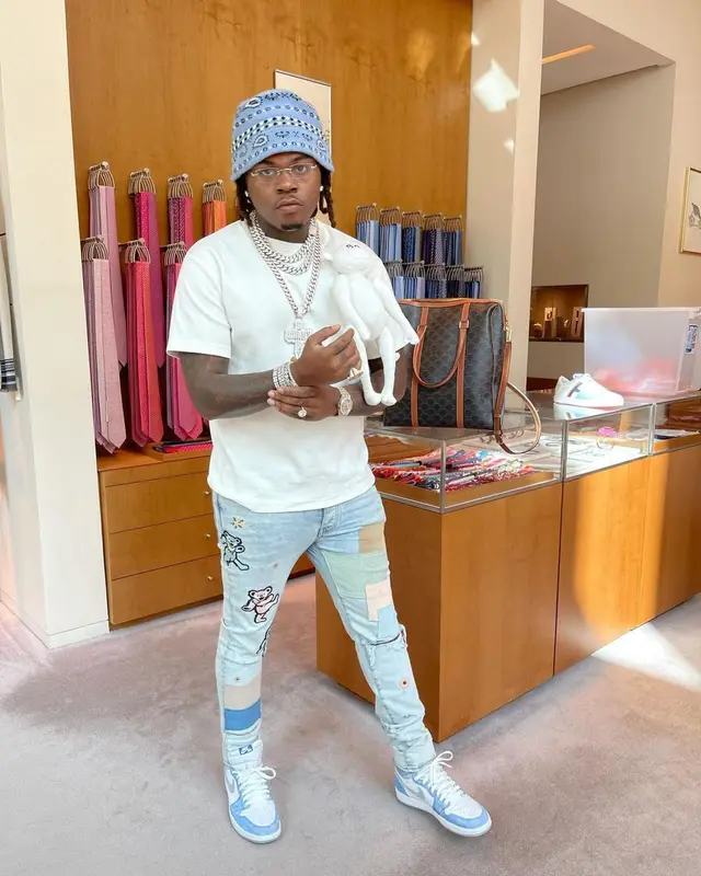 Gunna outfit in Louis Vuitton, Cartier, and Alanui, 2021