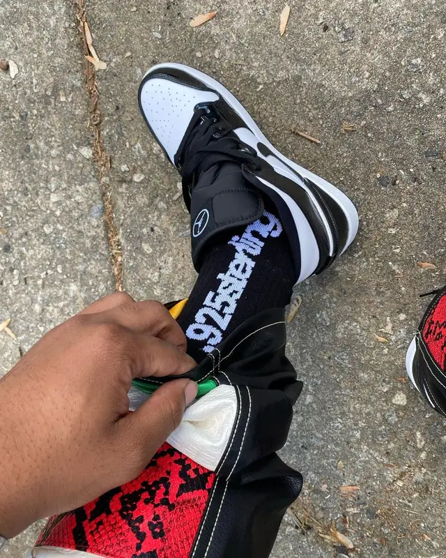 Lil Keed outfit in Whensmokeclears, Nike, and RoyGBiv, 2021
