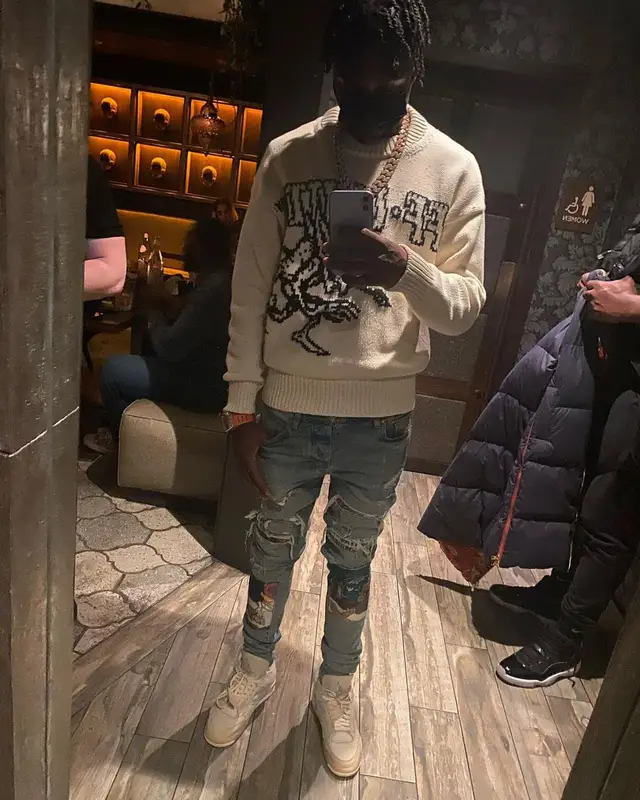 Lil Tjay outfit in Off-White, Amiri, and Jordan, 2021
