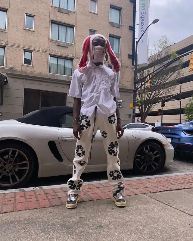 Ian Connor outfit in Maison Margiela, Denim Tears, and Gucci, 2021