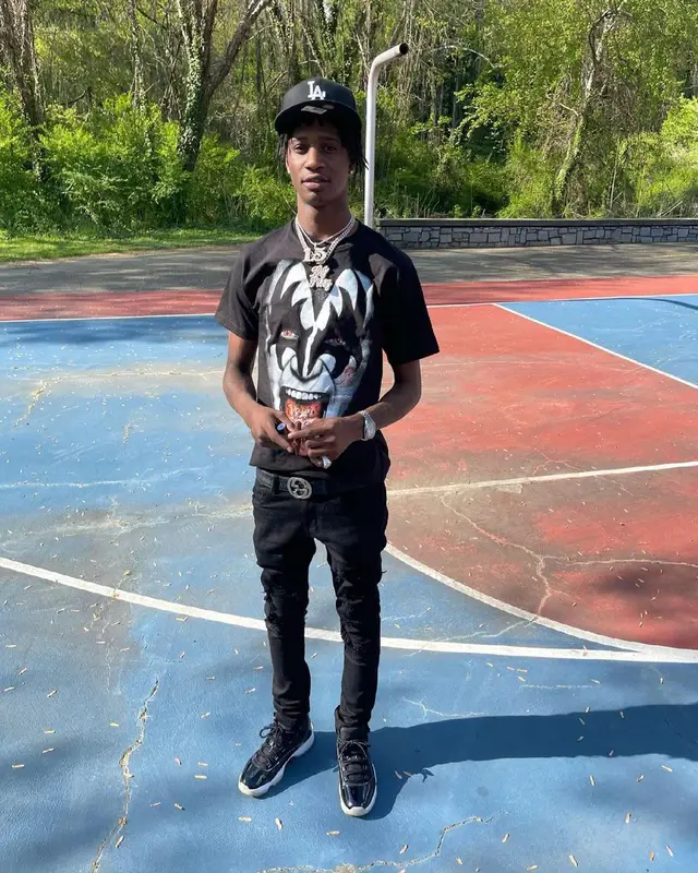 Yung Mal outfit in Jordan, Gucci, and New Era, 2021