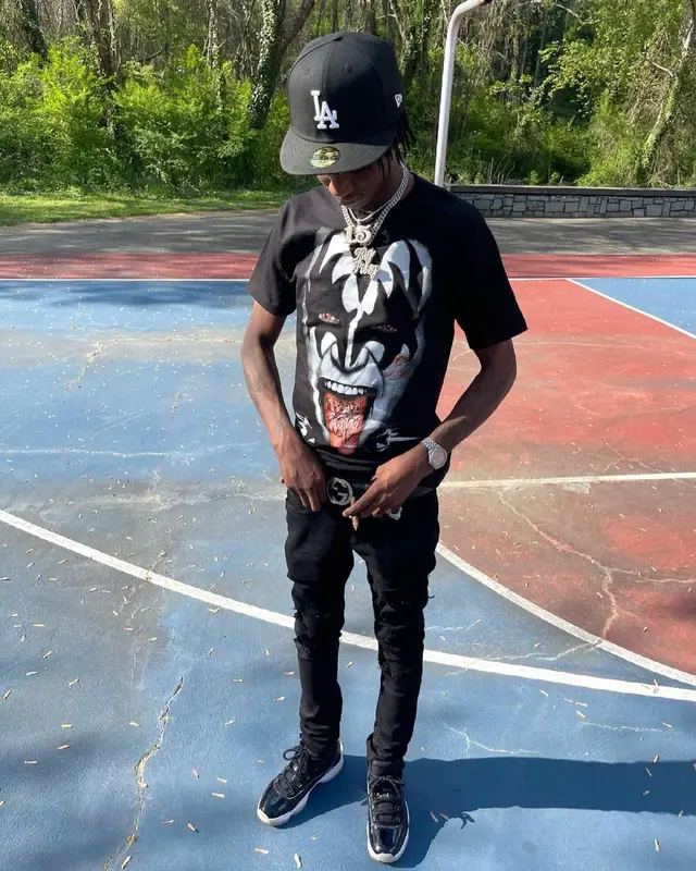 Yung Mal outfit in Jordan, Gucci, and New Era, 2021